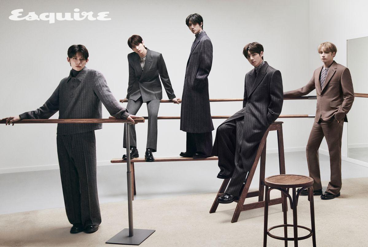 (연준) 그레이 스트라이프 버진 울 트윌 풀오버 재킷, 니트 톱, 그레이 스트라이프 버진 울 트윌 지퍼 팬츠, 더비 슈즈 모두 디올 맨. (수빈) 버진 울 트윌 바 재킷, 스모크 이펙트 오블리크 지퍼 니트 톱, 팬츠, 더비 슈즈 모두 디올 맨. (범규) 그레이 스트라이프 버진 울 트윌 바 코트, 니트 톱, 그레이 스트라이프 버진 울 트윌 플레어 팬츠, 더비 슈즈 모두 디올 맨. (태현) 스트라이프 버진 울 트윌 바 코트, 니트 톱, 스트라이프 버진 울 트윌 팬츠, 더비 슈즈 모두 디올 맨. (휴닝카이) 브라운 버진 울 트윌 바 재킷, 니트 톱, 팬츠, 더비 슈즈 모두 디올 맨.