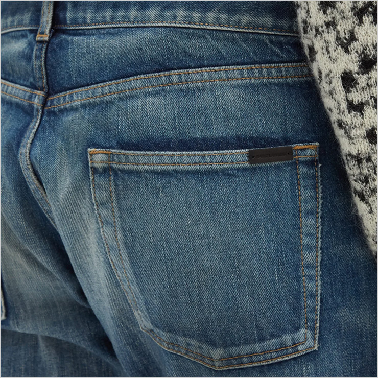 Faded slim-leg jeans, $643 USD