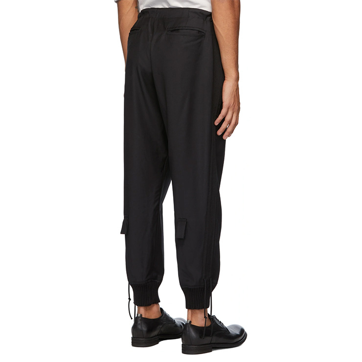 Black Tux Stacked Lounge Trousers, $1000 USD.