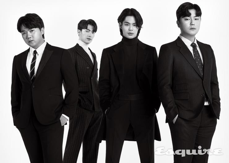 (왼쪽부터) 존노 턱시도 슈트 엠포리오 아르마니. 셔츠, 타이 모두 스타일리스트 소장품. 황건하 더블브레스트 슈트 엠포리오 아르마니. 터틀넥 니트 스타일리스트 소장품. 김바울 싱글브레스트 코트. 터틀넥 니트 스타일리스트 소장품. 팬츠 엠포리오 아르마니. 고영열 싱글브레스트 슈트 엠포리오 아르마니. 셔츠, 타이 모두 스타일리스트 소장품.