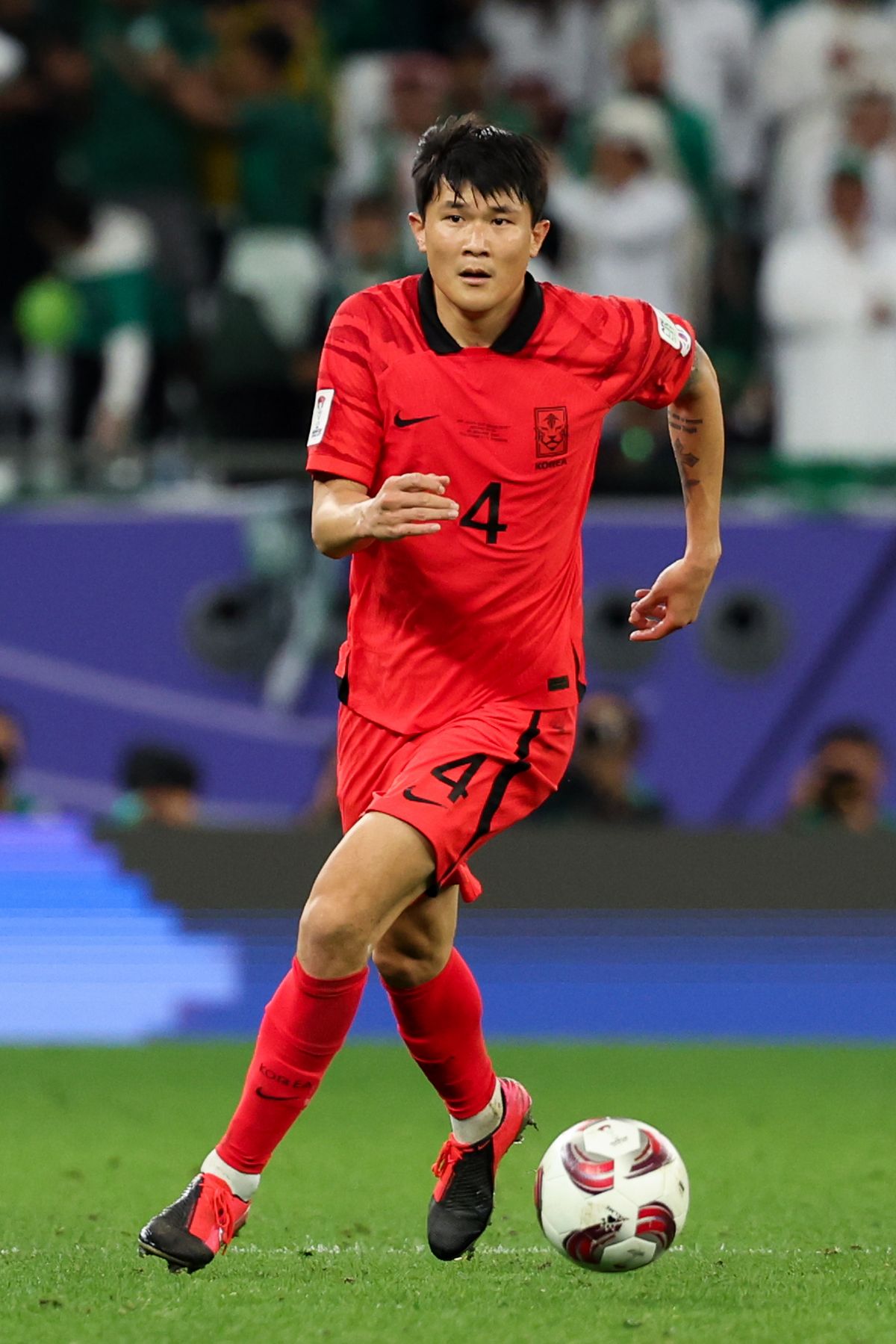 AL RAYYAN, QATAR - JANUARY 30: Kim Minjae #4 of South Korea controls the ball during the AFC Asian Cup Round of 16 match between Saudi Arabia and South Korea at Education City Stadium on January 30, 2024 in Al Rayyan, Qatar. (Photo by Zhizhao Wu/Getty Images)