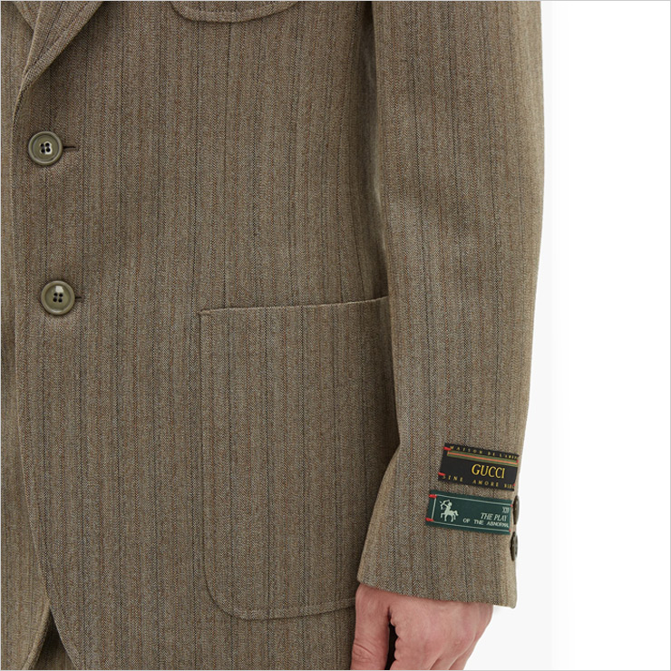 Single-breasted herringbone wool-blend blazer, $3,195 USD