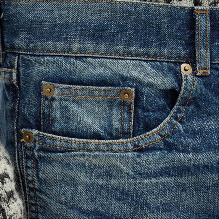 Faded slim-leg jeans, $643 USD