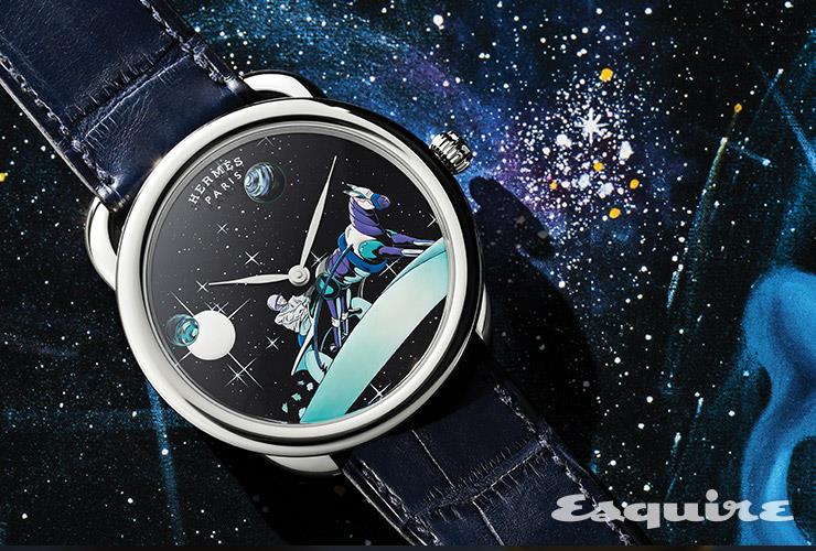 군더더기 없는 41mm 화이트 골드 케이스, 어벤츄린 다이얼 위를 장식한 스페이스 더비 모티브 미니어처 페인팅, 매트하게 처리한 블루 아비스 스트랩의 조화가 인상적이다. 아쏘 스페이스 더비 에르메스.