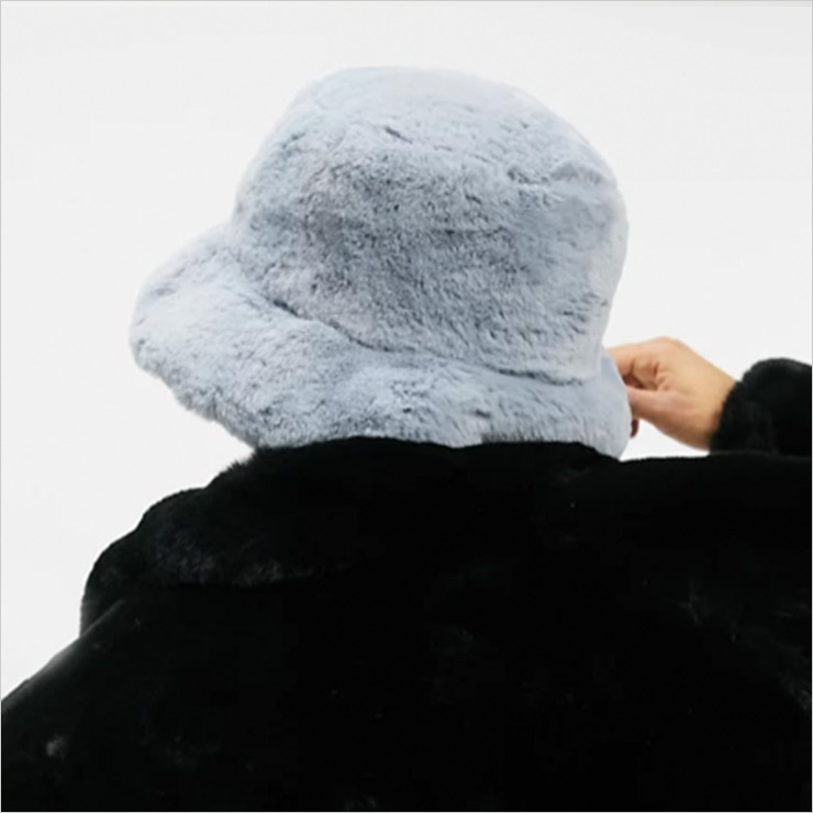 faux fur bucket hat in pale blue, $23 USD