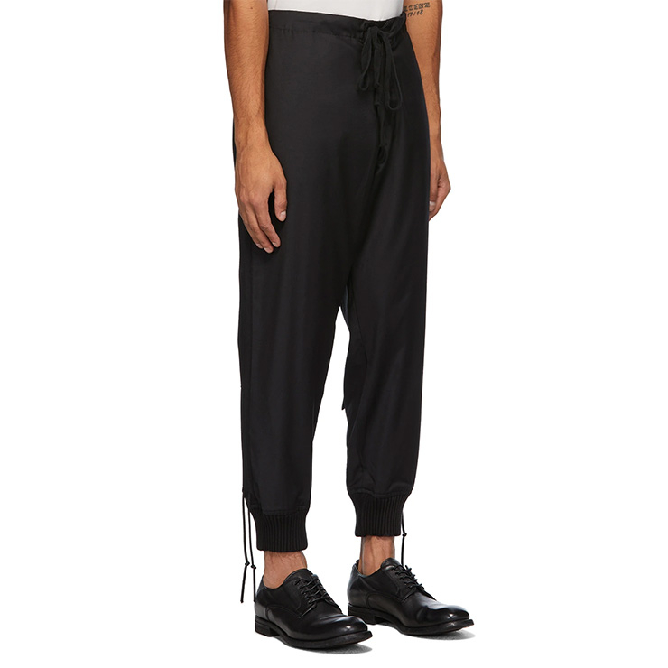 Black Tux Stacked Lounge Trousers, $1000 USD.