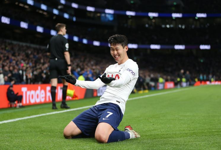 LONDON, ENGLAND - DECEMBER 05: Heung-Min Son of Tottenham Hotspur celebrates after scoring their sides third goal during the Premier League match between Tottenham Hotspur and Norwich City at Tottenham Hotspur Stadium on December 05, 2021 in London, England. (Photo by Tottenham Hotspur FC/Tottenham Hotspur FC via Getty Images)