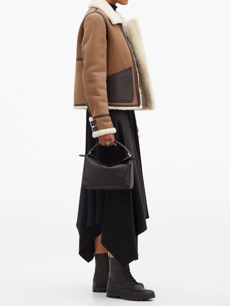 Puzzle small grained-leather cross-body bag, $2,698 USD